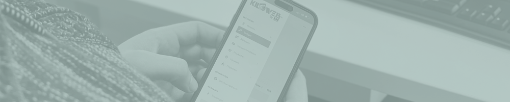 This is a photo of a person using the Kiloweb weighing software on a smartphone