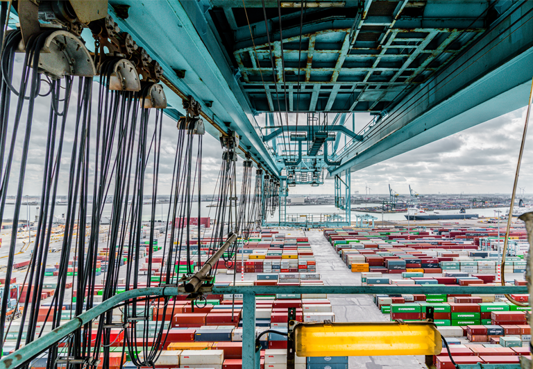 This is an atmospheric photo in the port of Antwerp with a view of the containers from a crane on which visibility solutions from RDS Weighing & Safety are mounted.