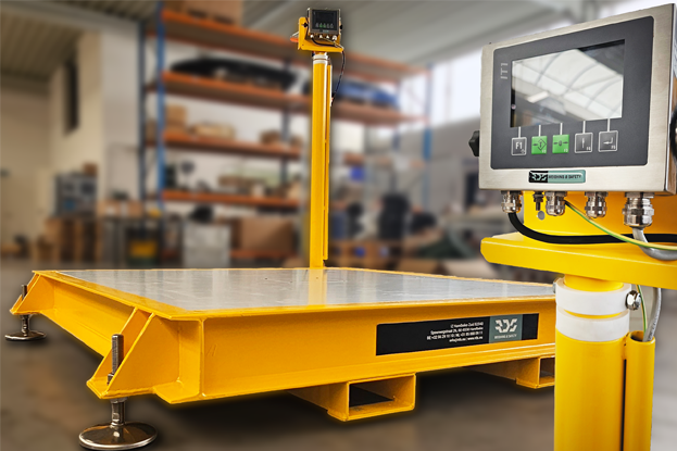 This is a platform scale PW3000 in yellow in the warehouse of RDS Weighing & Safety